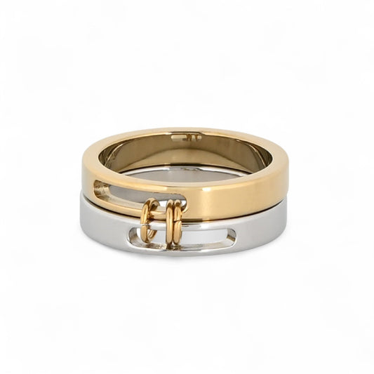 Anillo doble de acero inoxidable en plata y dorado con unión metálica frontal. Joyería unisex genderless